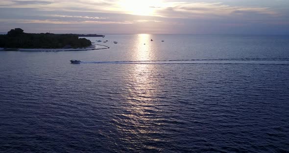 Wide overhead island view of a paradise sunny white sand beach and turquoise sea background in high 