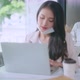 Asian attractive beautiful woman with face mask sitting at table near window - VideoHive Item for Sale