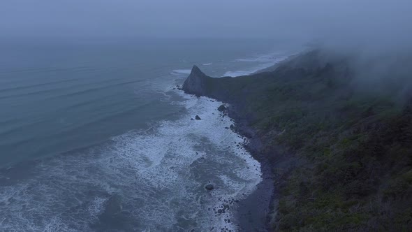 Drone captured waves and rocks, aerial shot of rock over the coast (Humboldt Lagoons, California)