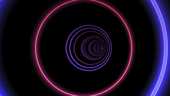 Movement Through the Tunnel of Colorful Neon Rings