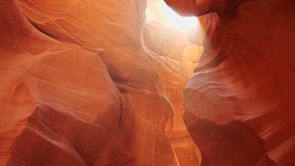 Dust Flies in the Sun in Antelope Canyon, Zoom Out Shot of Red Walls of Antelope Canyon in Arizona