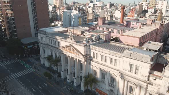 Aerial dolly out of the Faculty of Economic Sciences, part of the public University of Buenos Aires