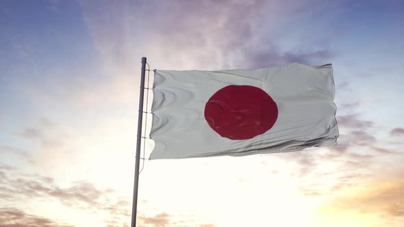 Japan Flag Waving in the Wind Dramatic Sky Background