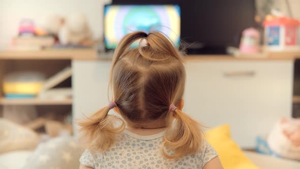 Little Girl Watching Cartoon. Kids Leisure And Entertainment. Children Watching Fairy Tale Story.