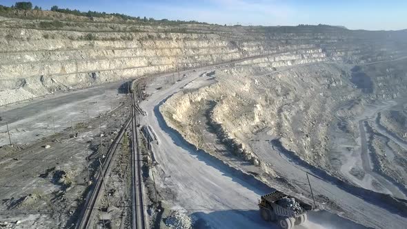 Aerial View Dump Loaded Truck Drives Along Terrace Road