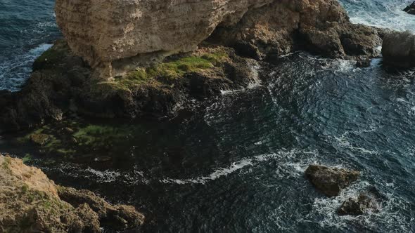 Seascape From Top View on Sea Waves and Large Stones in Water