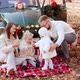Mom with Dad and Two Daughters at a Christmas Photo Shoot - VideoHive Item for Sale