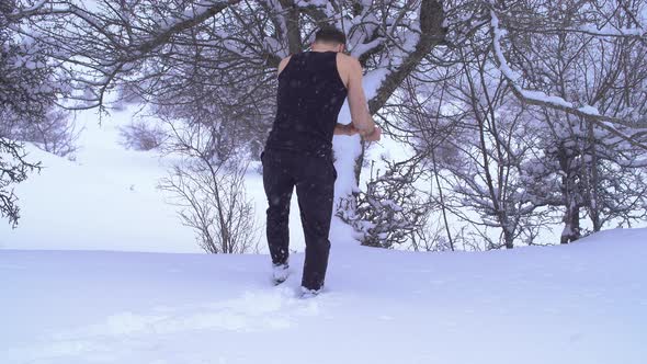 Injured man in the middle of the storm on a cold winter day.