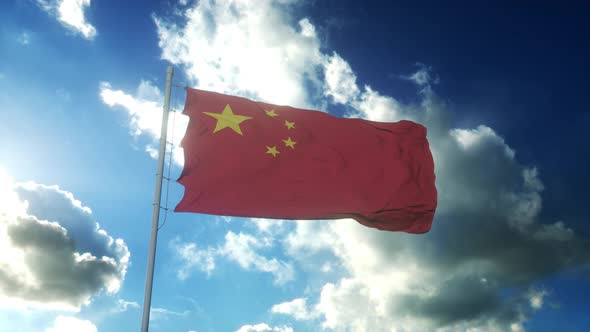 Red Flag of China Waving at Wind Against Beautiful Blue Sky