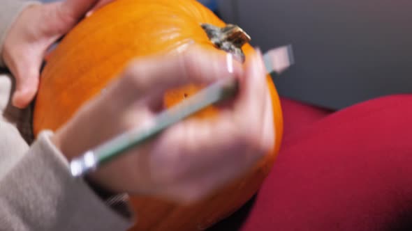 Hands Carves a Scary Halloween Pumpkin