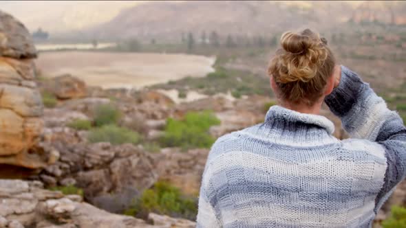 Man standing on a mountain top