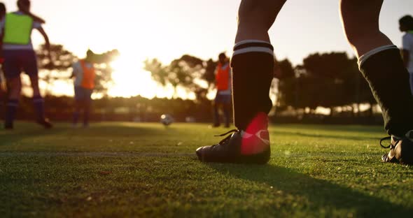 Female soccer team training on soccer field. 4k