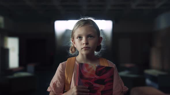 Schoolgirl Holding Books Afraid to Enter Classroom Closeup