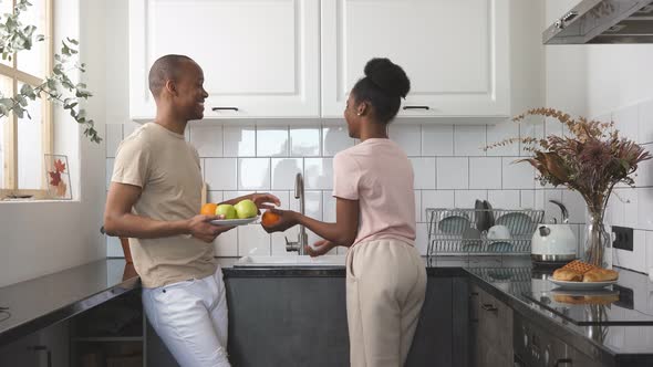 Friendly Married Couple in the Kitchen