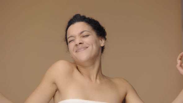 Beauty Portrait of Young African American Woman Sipping and Yawning