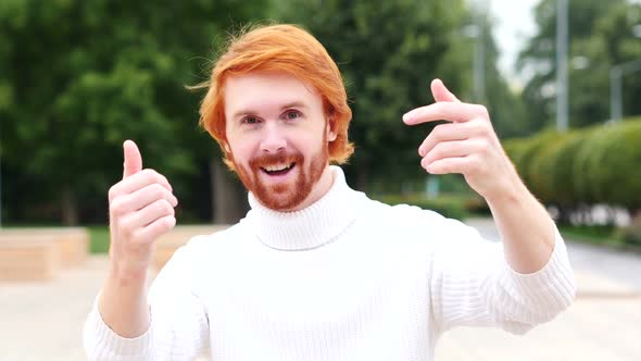 Inviting Man with Red Hairs, Outdoor Hands Gesture, Outdoor