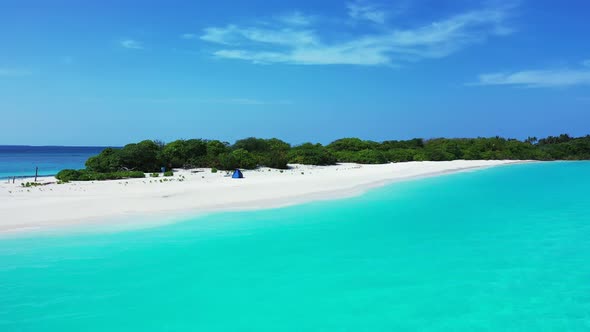 Wide above copy space shot of a white sand paradise beach and turquoise sea background in best quali