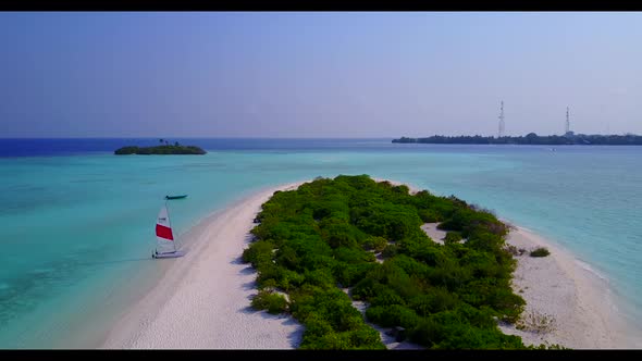 Aerial top view panorama of idyllic island beach journey by blue water with white sand background of