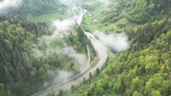 River in the Mountains. Slow Motion. Carpathians. Ukraine. Aerial.