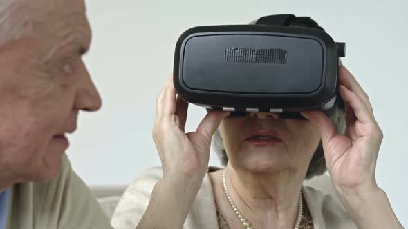 Elderly Couple with Virtual Reality Glasses