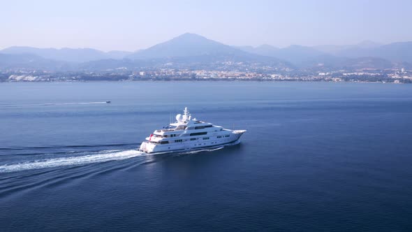 Megayacht cruising on the crowded coast of Andalusia