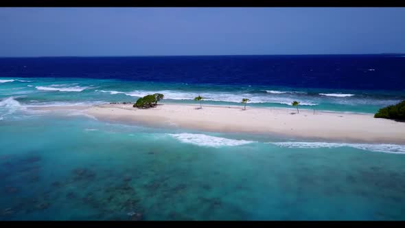 Aerial top down sky of paradise resort beach holiday by transparent lagoon with white sandy backgrou