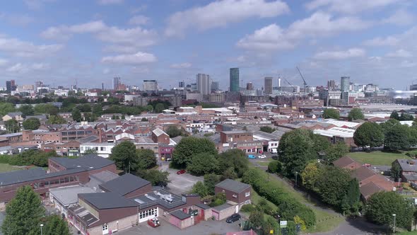 Left to right aerial shot over Birmingham city centre