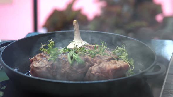 Steak with Herbs on Pan.