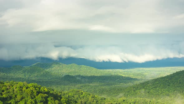 Rain storms and black clouds moving over the mountains.