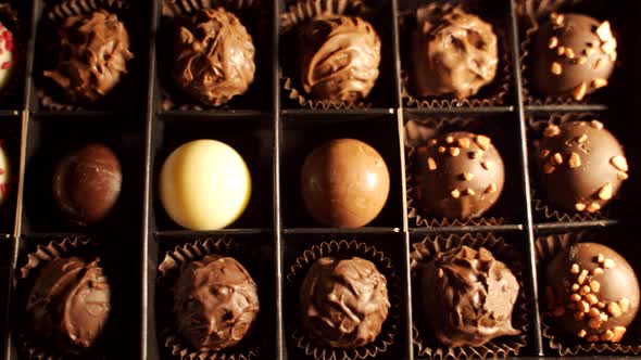 Bunch of different vegan dark and white chocolate truffles balls