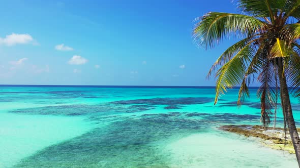 Natural flying copy space shot of a summer white paradise sand beach and aqua turquoise water backgr