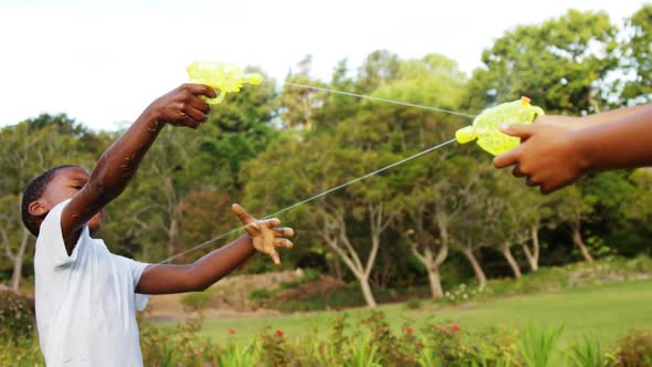 Kids playing with water gun