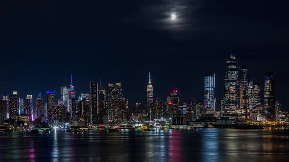 Midtown Manhattan Skyline New York City and Moon at Night