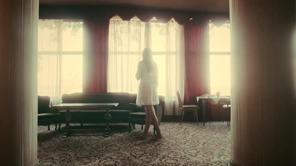 Woman in an old vintage Hotel