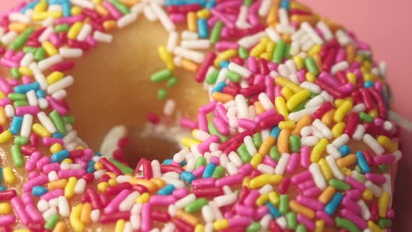 Close Up of Fresh Baked Donuts on Pink 