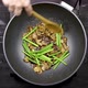 Garlic Sprouts and Mushrooms with Chicken Fillet are Fried a Wok Skillet - VideoHive Item for Sale