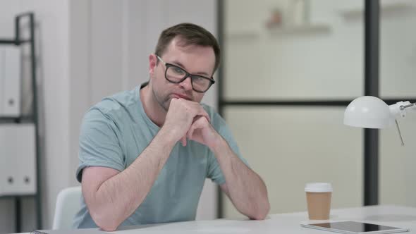 Pensive Young Man Thinking Work