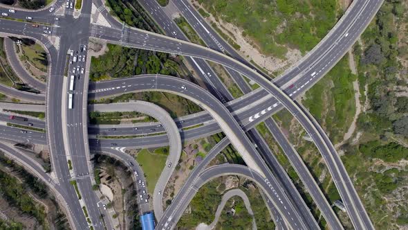 Massive multi level highway interchange with traffic on all routes, Aerial view.