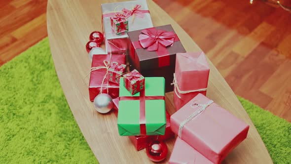 Christmas gift box on the table and lights ornaments Christmas celebrates the new year.