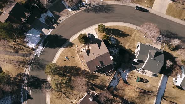 Aerial view of residential neighborhood in suburbia in snowless Winter