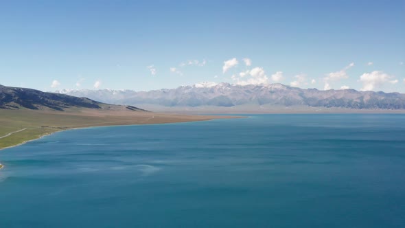 Lake and grassland with a sunny day