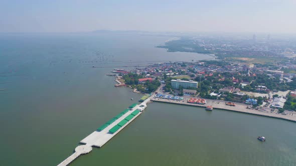 Aerial view of Ang Sila in Sri Racha district with sea, Chonburi skyline, Thailand. Urban city