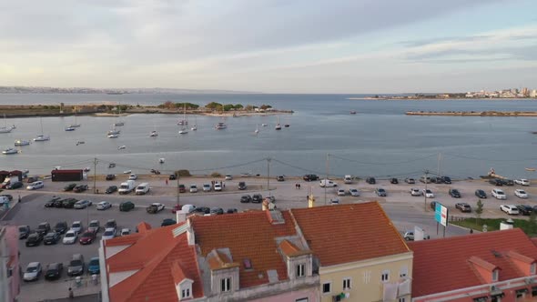 aerial shot over buildings and Seixal bay - Portugal