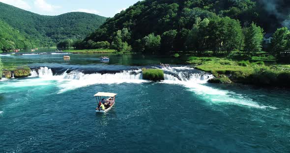 Aerial view of a boat sailing the Una River, Croatia.