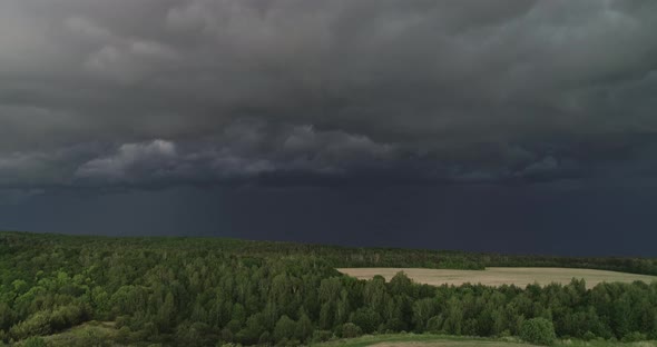 Aerial Dark Ominous Grey Storm Clouds. Dramatic Sky. Lighting In Dark Stormy Clouds