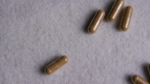 Rotating stock footage shot of vitamins and pills - VITAMINS 0028