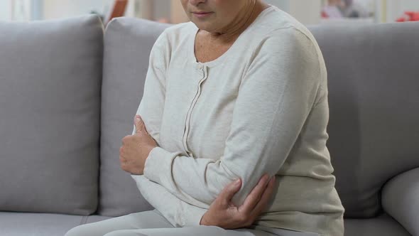 Woman Feels Pain in Stomach, Concept of Female Health Problems in Middle Age