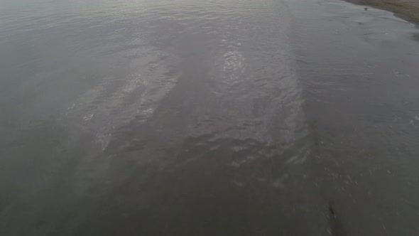 Taken from the popular Portobello Beach, flying over the shore before a dramatic pan lift.