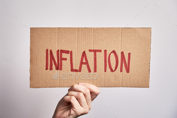  hold paper sheet with word inflation, Rising prices for consumer goods and services