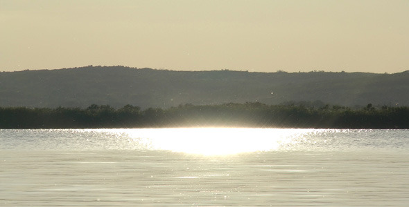 Sun Reflecting On The Lake